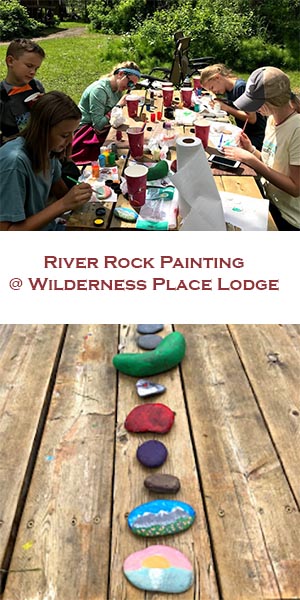 Kids painting river rocks at our Alaska lodge