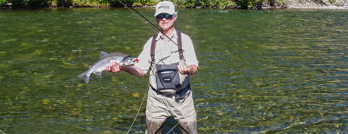 Nice pink salmon on fly fishing gear at our Alaska lodge.