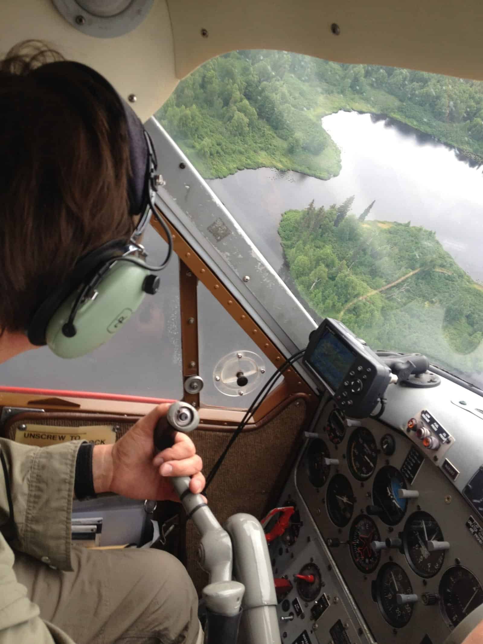 Float plane flight into remote Alaska and Solitude Island Retreat cabin escape for couples and families seeking wilderness.