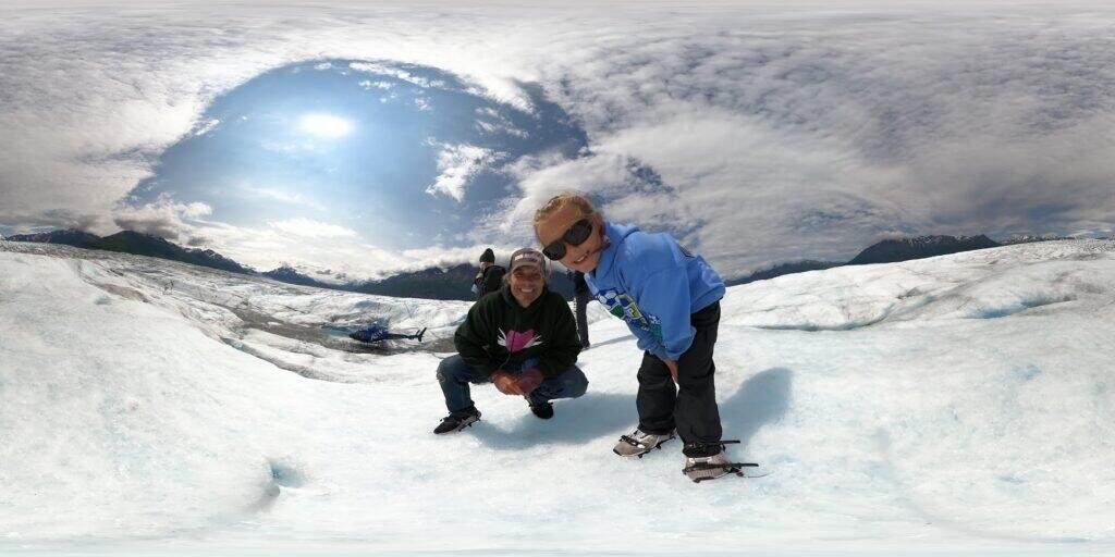Alaska glacier adventure with father and daughter enjoying a great helicopter tour north of Anchorage.