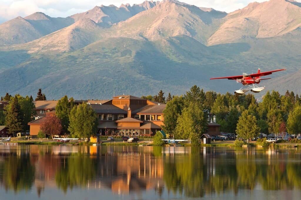 lakefront-anchorage-hotel-exterior - Wilderness Place Lodge Alaska - Wilderness Place Lodge Alaska The Anchorage Lakefront hotel on the shores of Lake Spenard and Lake Hood Seaplane Base.