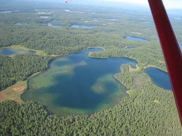 An overhead shot of a remote Alaska lake in the Susitna Valley.